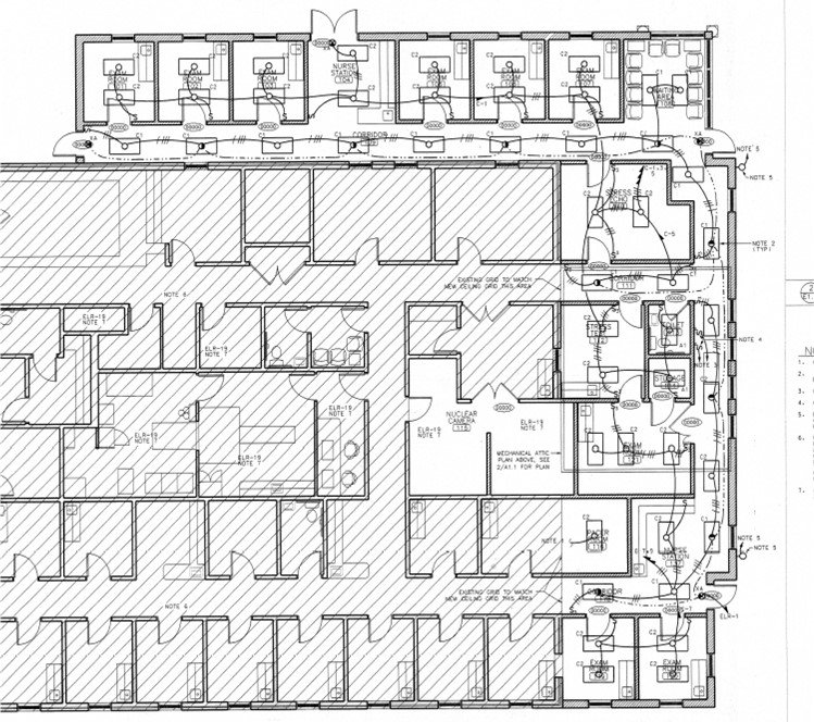 Floor plan showing exam rooms, nurse station, and expansion addition